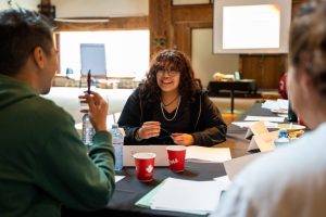 Copy of Coach Johannes with Youth team members defining start up budge Copy of Coach Johannes with Youth team members defining start up budge