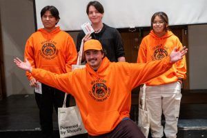 Copy of Coach Krist with Quw_utsun team members at grad event Copy of Coach Krist with Quw_utsun team members at grad event